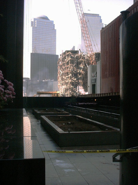 fire-ravaged wreckage of World Trade Center buildings following attack