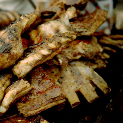 photograph of barbecued spare-ribs at New York City street fair